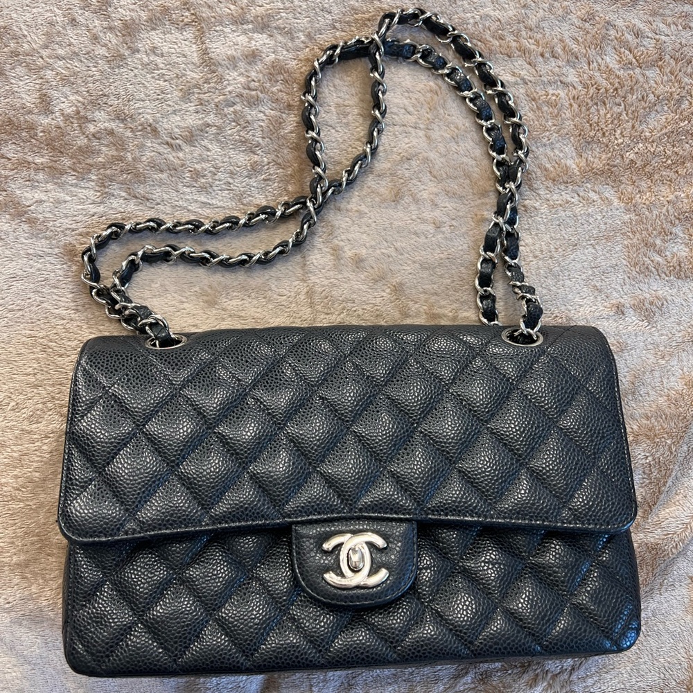 COPY - Authentic Chanel black caviar purse.